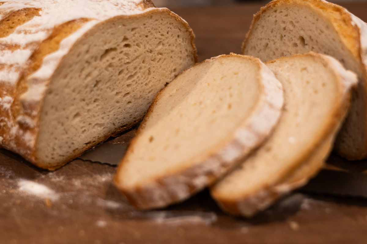 Freshly baked sourdough bread, sliced